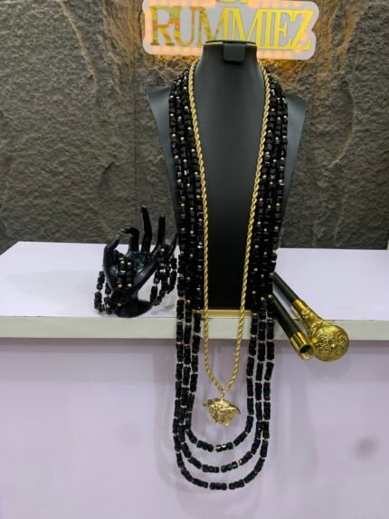 Black male bead, chain and stick